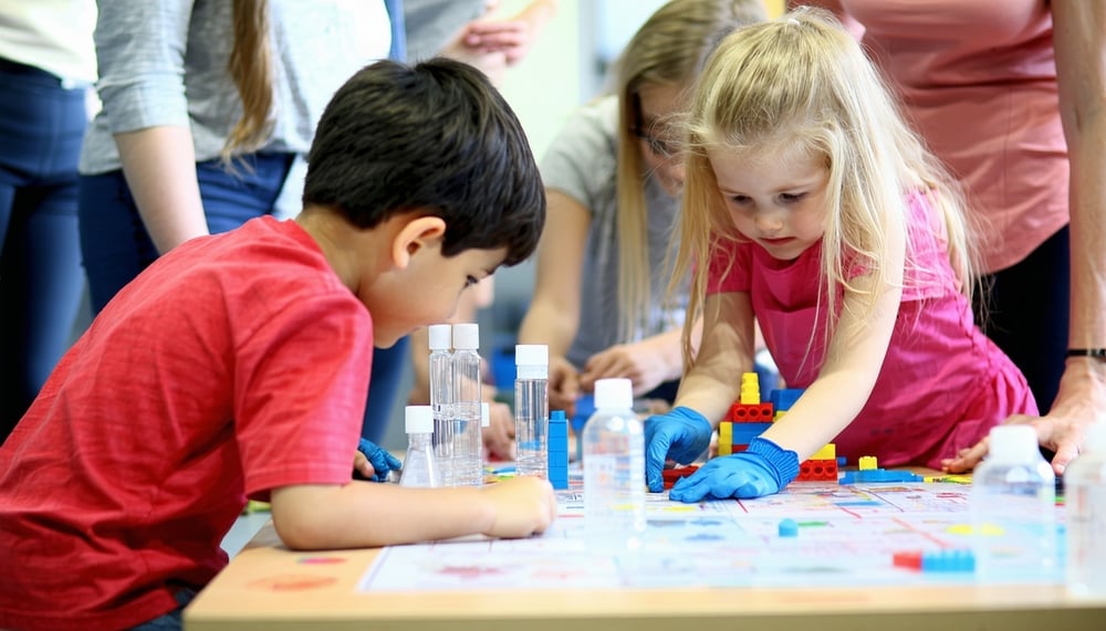 Children participating in a hands-on STEM activity Children participating in a hands-on STEM activity